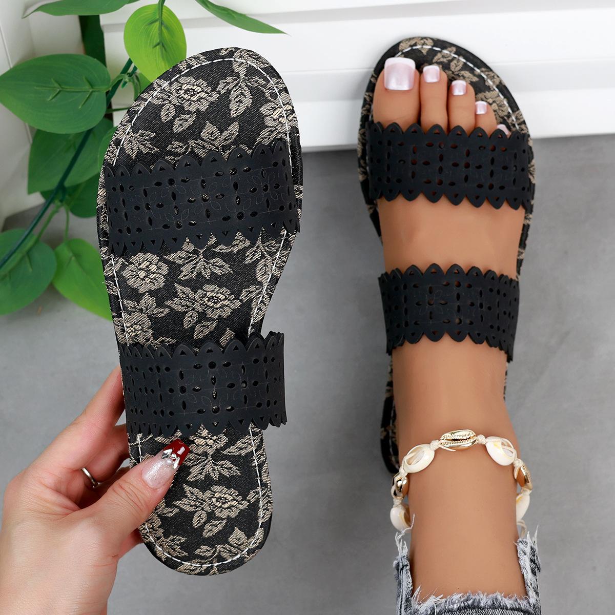 

Трансграничные тапочки большого размера на плоской подошве для летней верхней одежды для женщин, односложные модные пляжные сандалии с принтом и полыми носками 44 чёрный