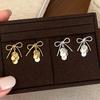 Sweet Bow Sequin Metal Tassel Earrings for Women Light Luxury Niche Fashion Jewelry Personality Temperament Versatile Earrings