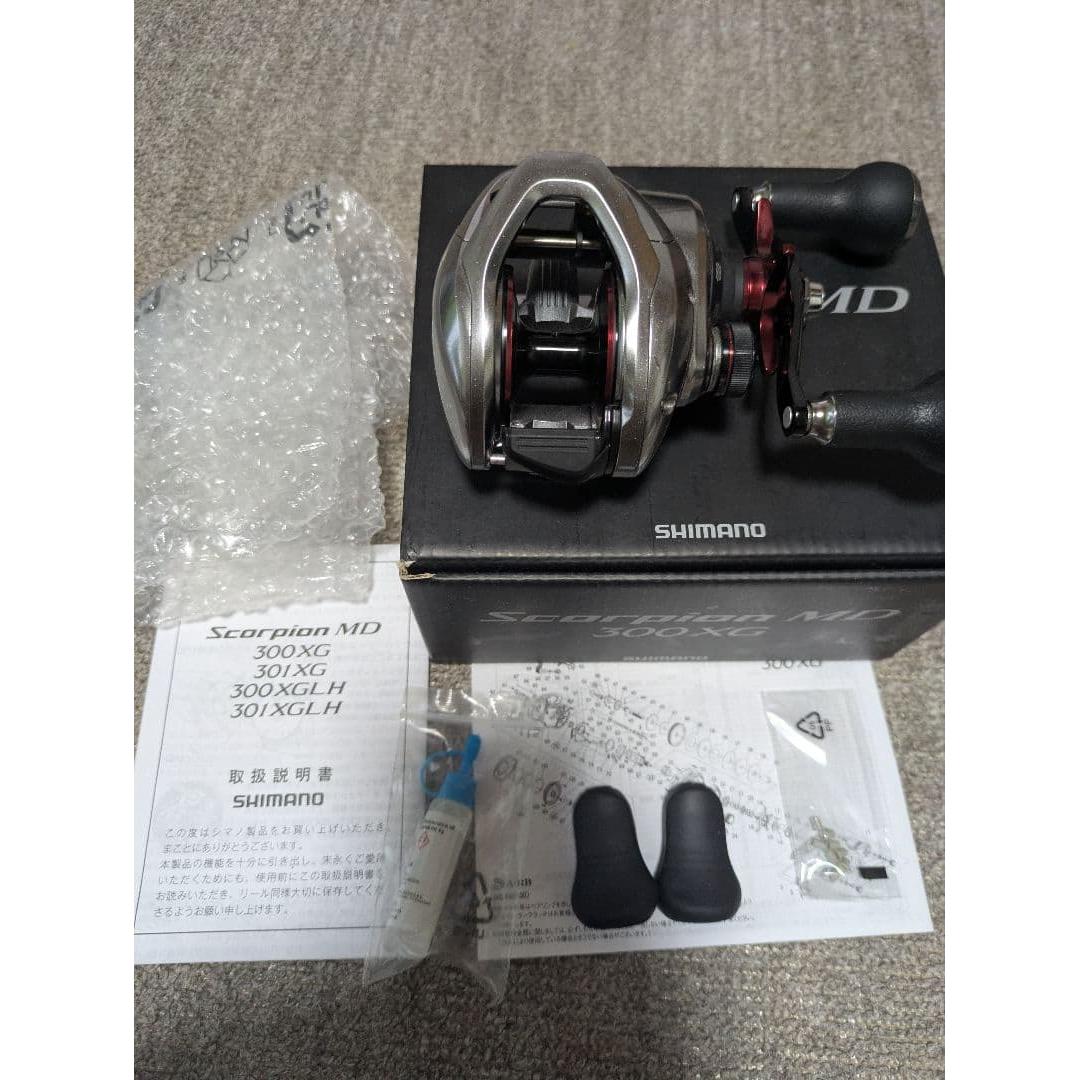 Used SHIMANO 21Scorpion MD 300XG with Gomexus handle