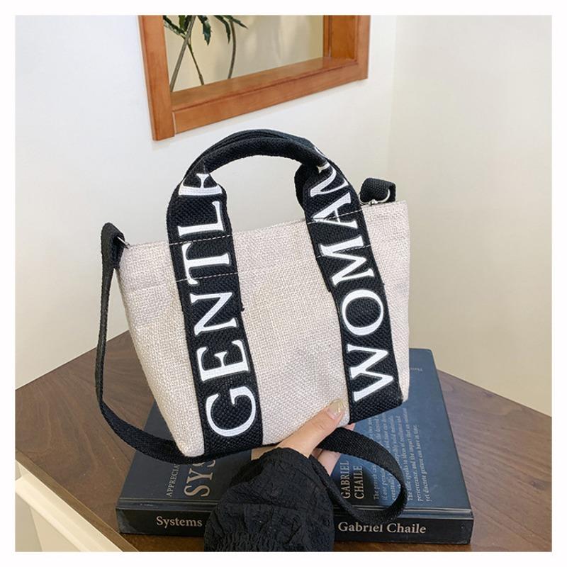 

Canvas handbag New letter large capacity multi-pocket shoulder bag Men s and women s messenger tote bag