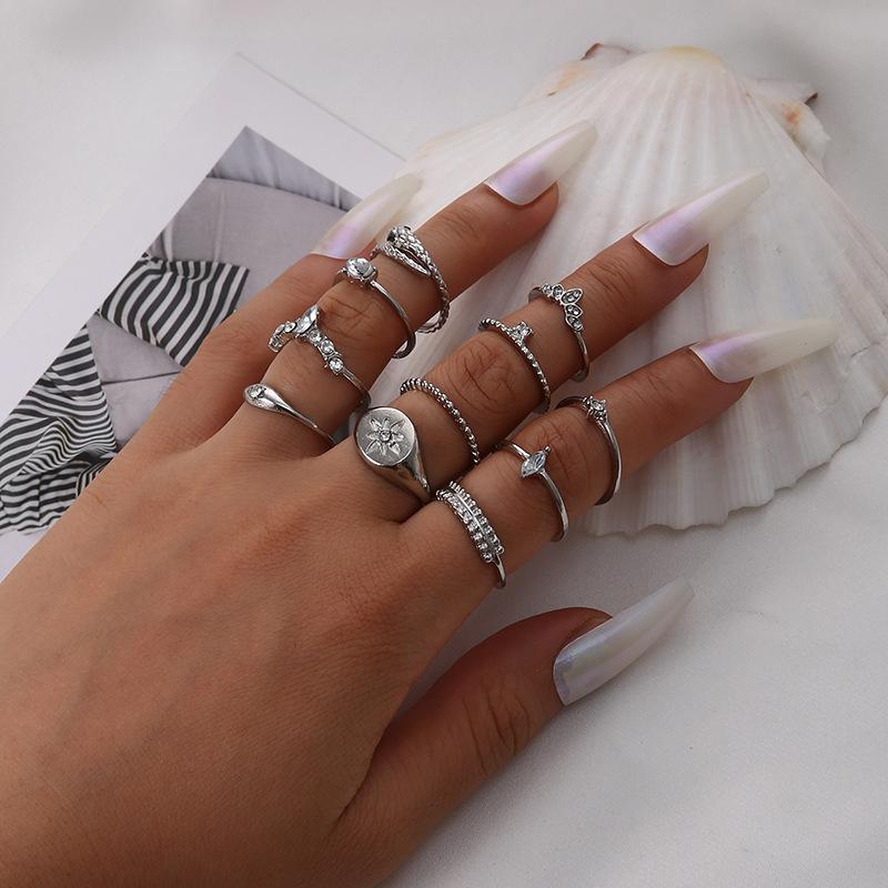 Bohemian Creative Drip Complex Personality Trend Black Eye Snake Star Pearl 11 Piece Set Ring