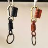 Punk Retro Distressed Leather Keyring: Genuine Cowhide Bag Charm with Multifunctional Woven Climbing Buckle