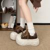 7CM thick-soled big-head casual shoes children's autumn 2026 new height-increasing muffin board shoes bread shoes