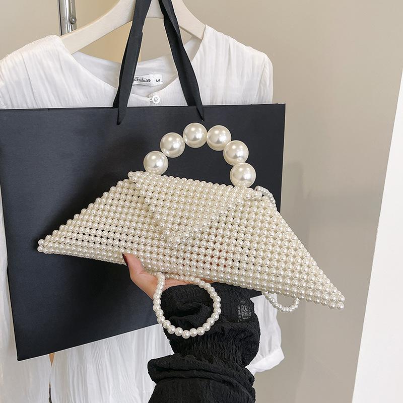 Holding pearl bag women's new spring and summer fashion woven bead small square bag temperament shoulder bag