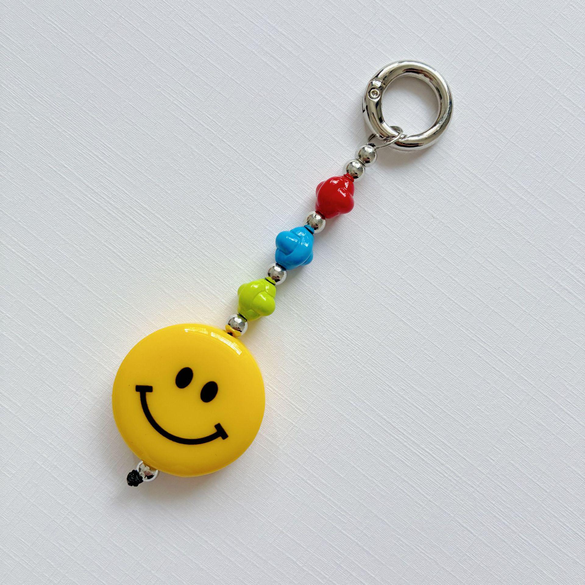 

Милая подвеска с улыбающимся лицом: Брелок из бисера и шнурок для мобильного телефона в японском и корейском стиле Colorful Bead Smiley Face Pendant