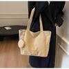 Women's large-capacity canvas bag, simple letters, versatile commuting artifact.