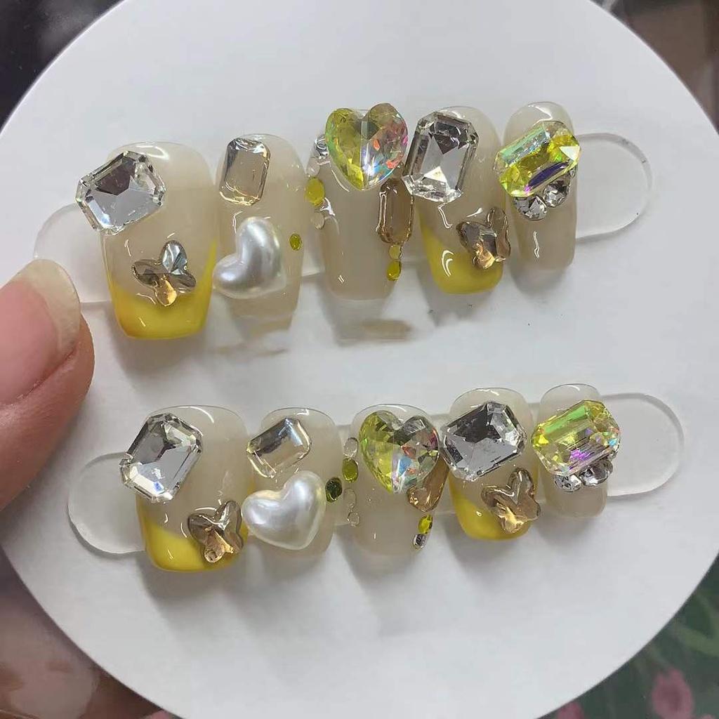 

РУЧНАЯ РАБОТА Искусственные ногти Фототерапия Ногти Желтый стиль Маникюр Носимый tiktok Горячие продажи готовой продукции Пластыри для ногтей Изнашиваемые съемные