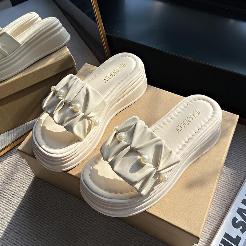 

Waterproof table sandals 2025 summer new Korean version ins small man shows height and popular outer slippers one-word drag woman 40