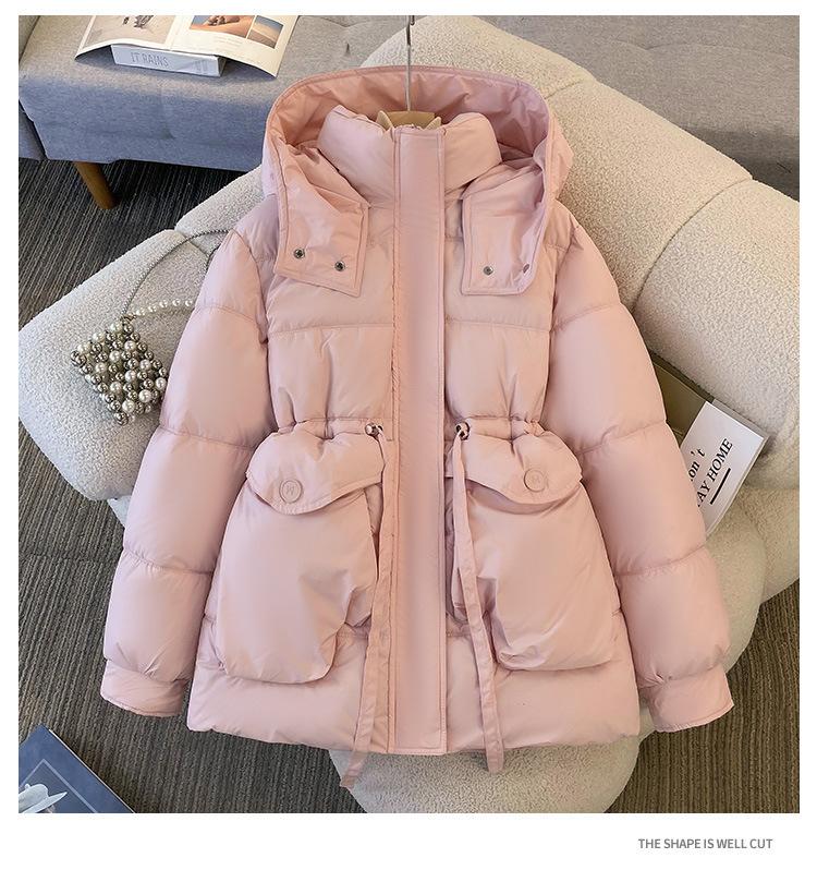 Padded clothes women's winter new long padded jackets close waist and look thin, thickened padded clothes, and thickened warm jackets.