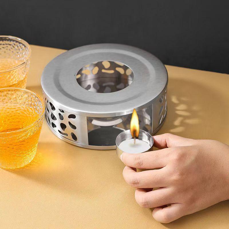 Stainless Steel Retro Teapot Set with Candle Warmer and Heat-Resistant Tea Brewing Stove.