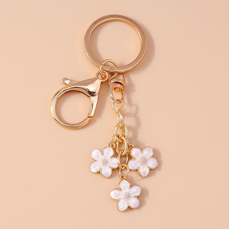 Niedlicher Emaille Sonnenblumen Schlüsselanhänger Frauen Mädchen Blume Schlüsselanhänger Anhänger für Handtaschen Deko DIY Handgefertigter Schmuck Geschenke