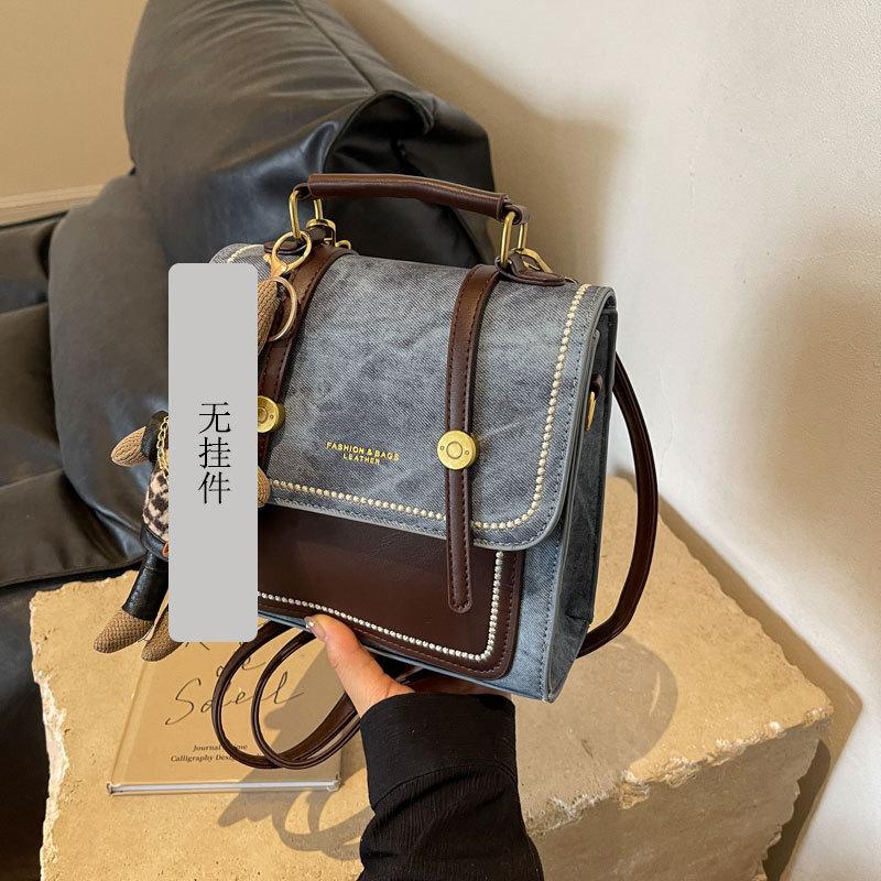 Нишевый дизайн ручной рюкзак женский 2025 новый модный и универсальный на плечо кроссбоди сумка высококлассный рюкзак