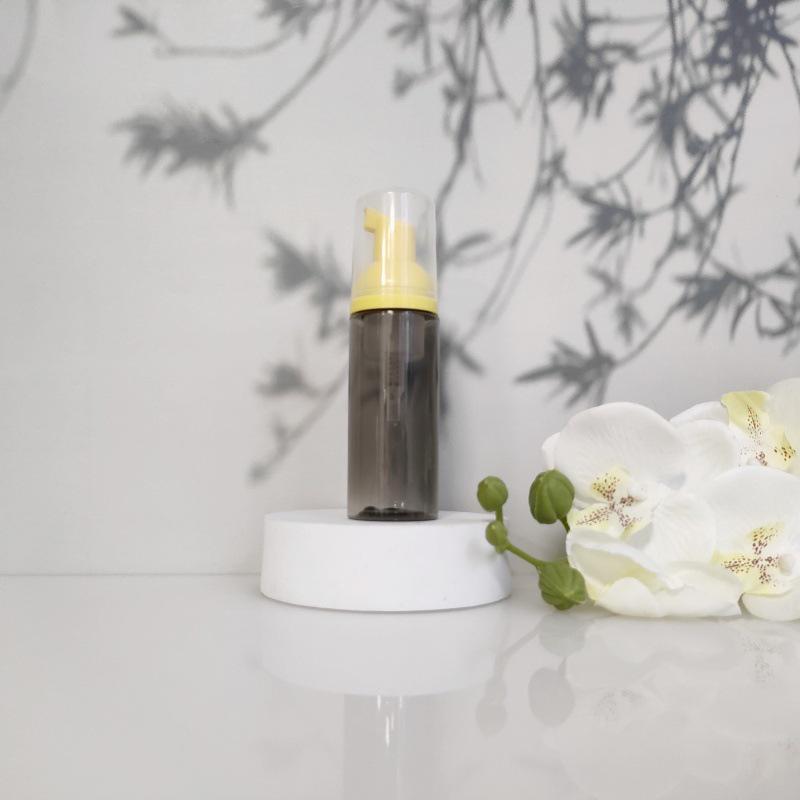 Available 60ml Transparent Black Foam Mousse Bottle for Face Wash and Travel-friendly Cosmetic Packaging.