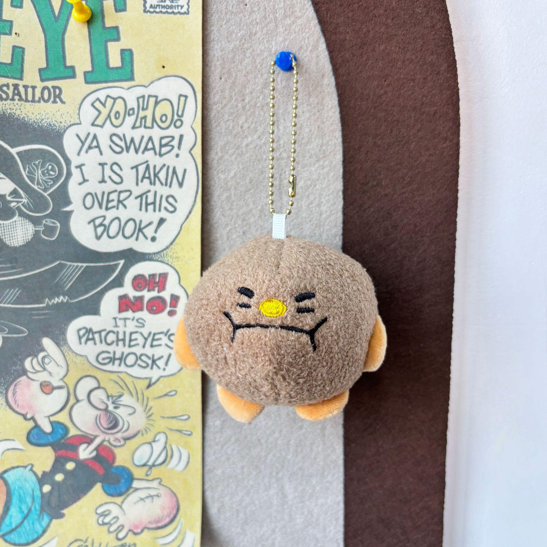 

Cartoon Beef Ball Hot Pot Plush Toy - Amusement Park Claw Machine Doll Pendant 7 cm