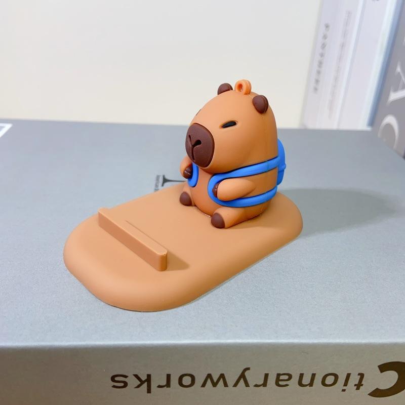 

1pc Cute Capybara Phone Stand Lazy Desk Organizer with Expressive Eyes Non-Slip Base Compatible with Smartphones Tablets Home Office Decor A