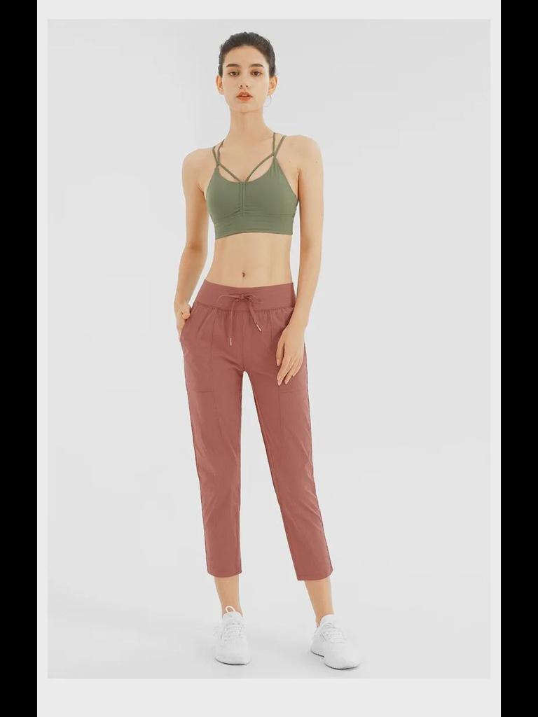 Women's Quick-Dry Yoga Pants: Breathable, Loose-Fit, Nine-Point Length with Drawstring for Running and Fitness.