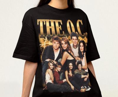 The O.C. Maglietta - T-shirt Ryan Atwood, Maglietta Seth Cohen, Maglietta Marissa Cooper, Summer Roberts