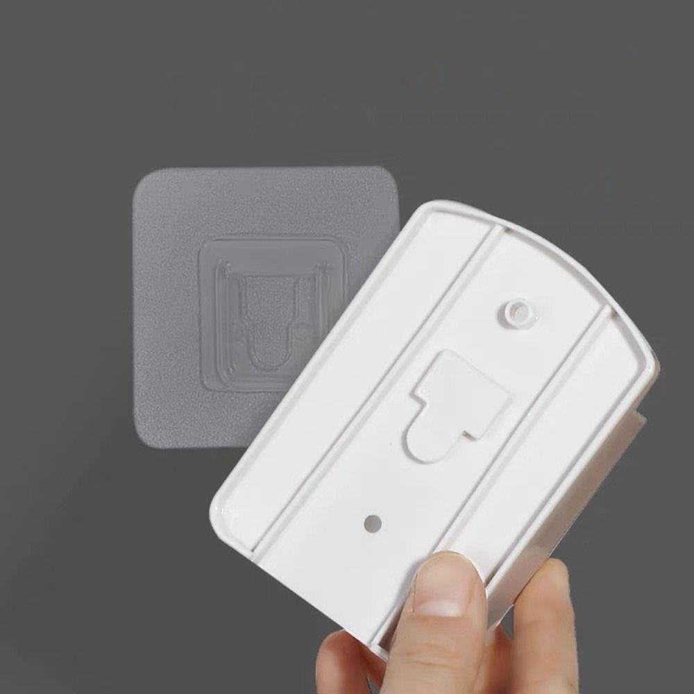 Plastic Air Conditioner Remote Control Holder White Wall Mounted Mobile Phone Plug Holder Space Saving Self Adhesive
