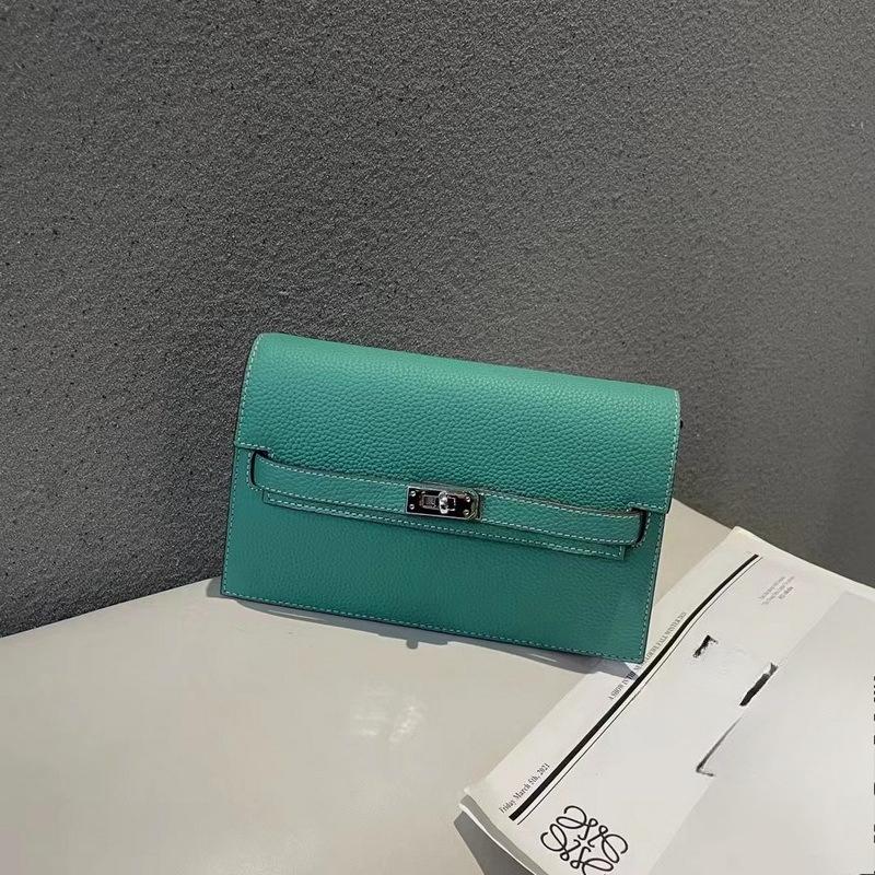 New lychee pattern leather half cover hand grab bag genuine leather women's bag single shoulder underarm bag oblique span bag wholesale