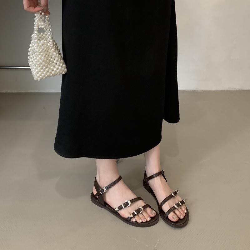 2025 summer new retro one-word buckle with flat sandals women's low-heeled beach shoes open-toed Roman women's shoes