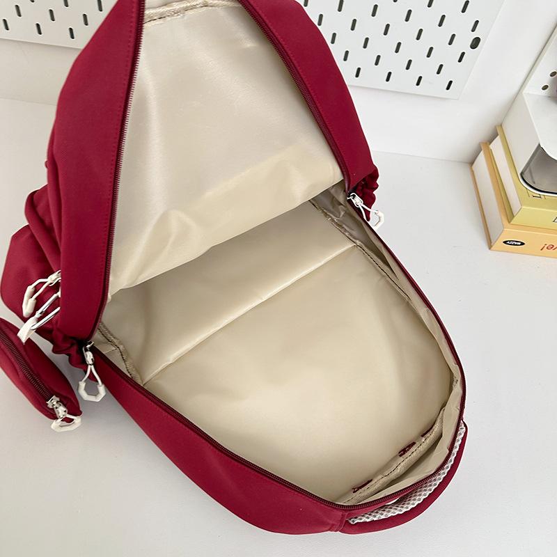 Large-capacity backpack New junior high school and high school student schoolbag Simple high-value versatile backpack Student schoolbag