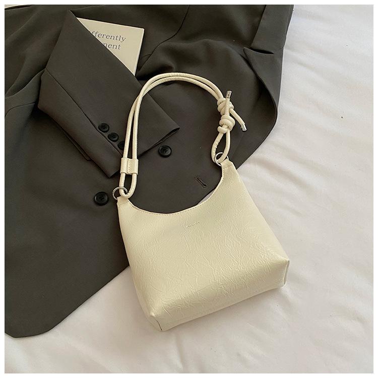 

Сумка-подмышка премиальной текстуры для ношения в руке женская 2025 корейская версия простая модная сумка на плечо нишевая универсальная сумка-мессенджер для поездок