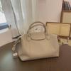 Japanese and Korean Soft Cowhide Handbag: Classic Women's Genuine Leather Dumpling Bag, Shoulder & Crossbody Style.