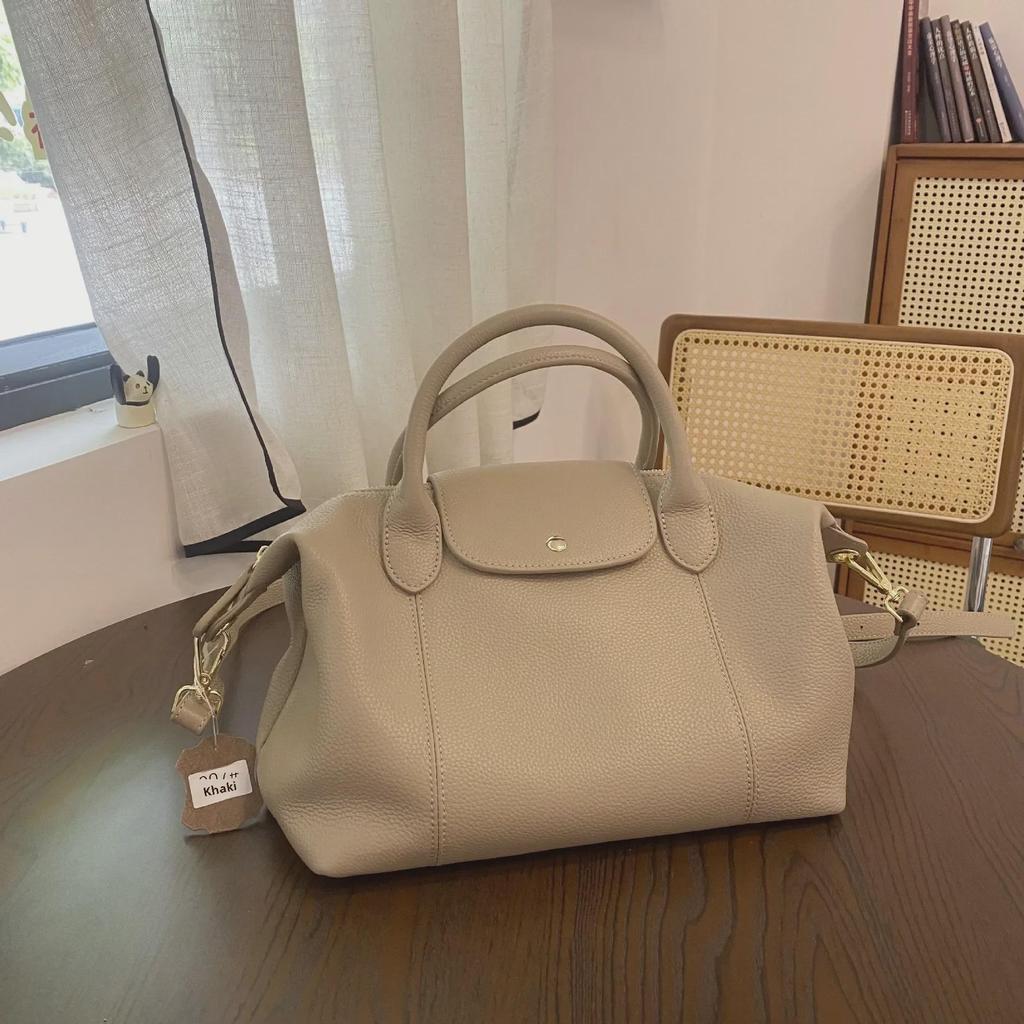 Japanese and Korean Soft Cowhide Handbag: Classic Women's Genuine Leather Dumpling Bag, Shoulder & Crossbody Style.