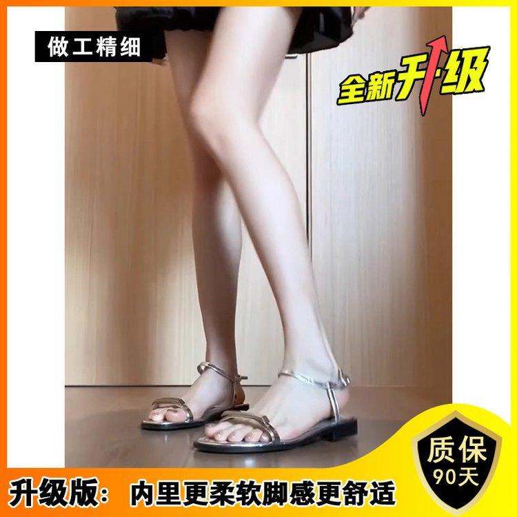 

Soft leather version! Sandals women s 2025 summer new black fashion metal buckle one-word strap low-heeled beach Roman shoes 40