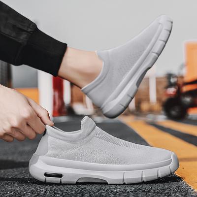 Moda 2025 Nowe męskie oddychające wsuwane sneakersy z siateczki Lekkie letnie buty codzienne dla studentów Antypoślizgowe buty do biegania i podróży