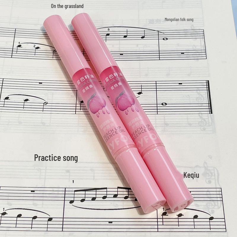 PinkyFocus Sweet Nourishing Lip Oil Hydrates and Smooths Lips, Reducing Lip Lines with a Peach Gloss Finish.