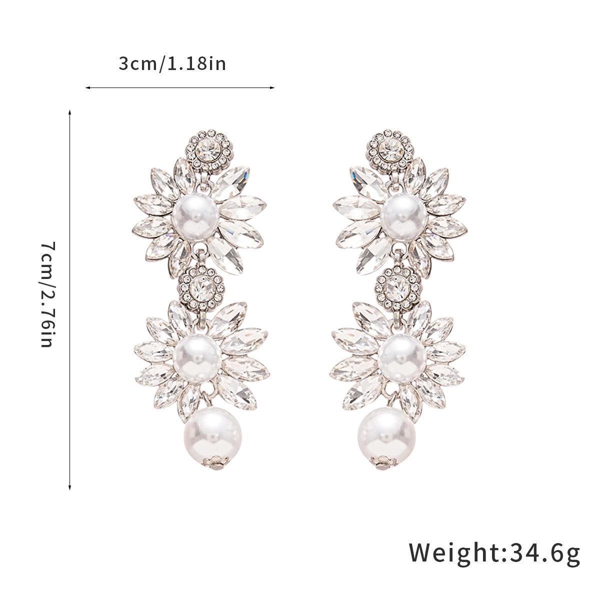 

Silver Needle Inlaid Diamond Flower Tassel Earrings - Elegant and Fashionable High-End Studs with Unique Design