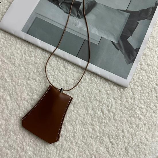 Подвесной шейный мешочек из искусственной кожи для монет — фото 12