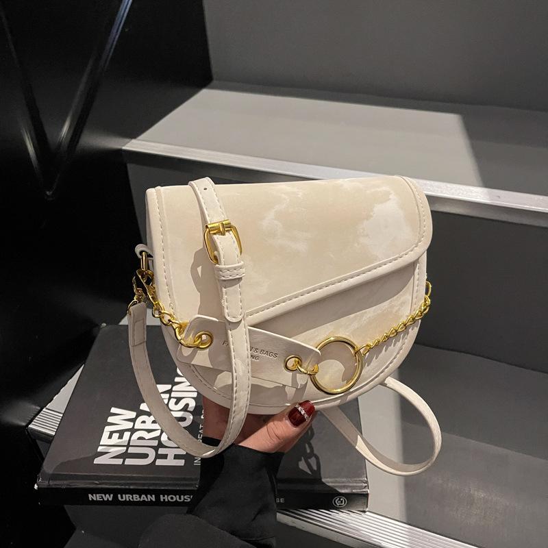 Heutige beliebte Nische halbrunde kleine Tasche Damen Handy-Tasche neue Mode vielseitige Umhängetasche Satteltasche