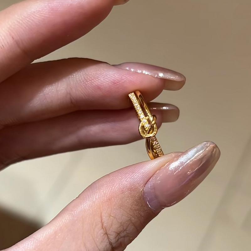 Elegant Gold Buckle Twisted Ring for Women, High-End Style, Index Finger Design, Double Layer Luxury, Versatile Fashion Accessory.