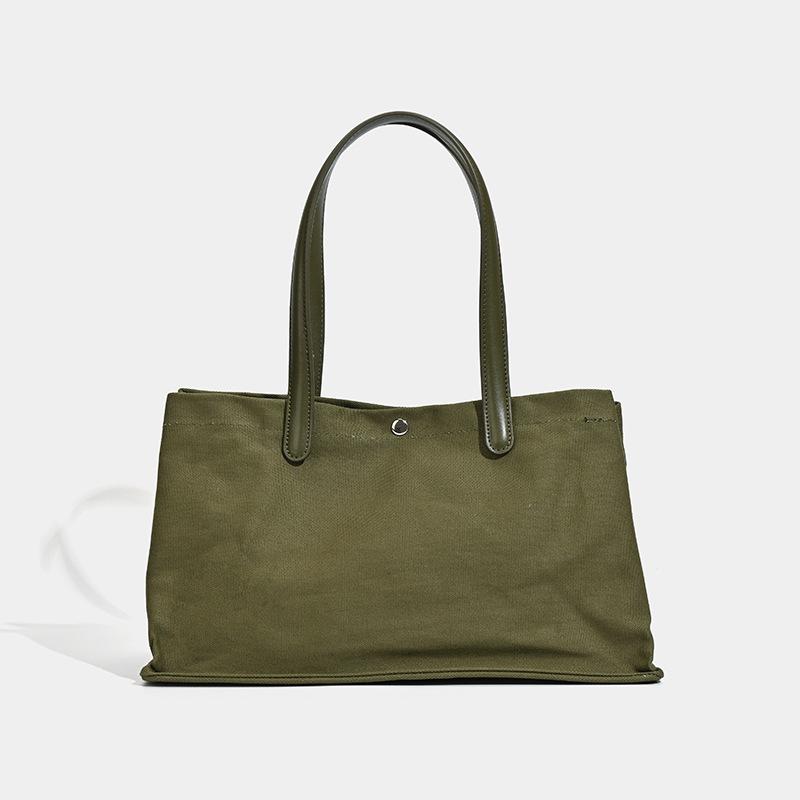

Niche design French trendy luxury leather splicing canvas large-capacity tote bag 2025 new commuter handbag оливковый