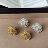 S925 silver needle French delicate lace pleated empty flower stud earrings niche personality trend commuter earrings earrings