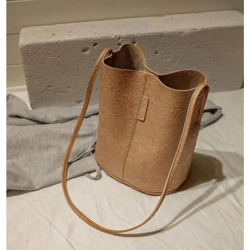 

New Tide Solid Oil PU Material Маленькая сумка-ведро Повседневная дикая женская сумка-мессенджер на одно плечо 22x17x25cm