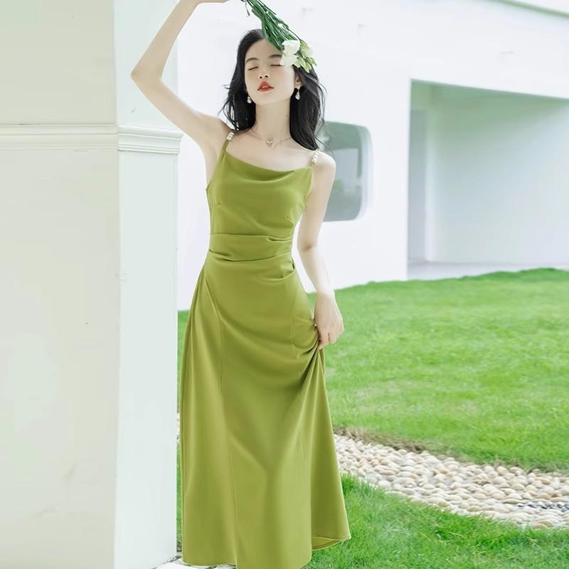 High sense temperament beautiful super fairy dopamine 2026 new summer vacation French suspender green dress tide