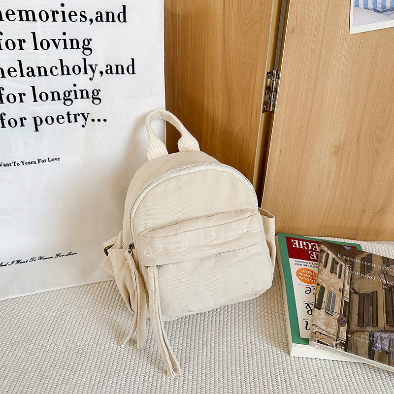 

Mini canvas backpack trendy brand niche design sense small backpack women s leisure sports cycling bag men s mobile phone backpack белый