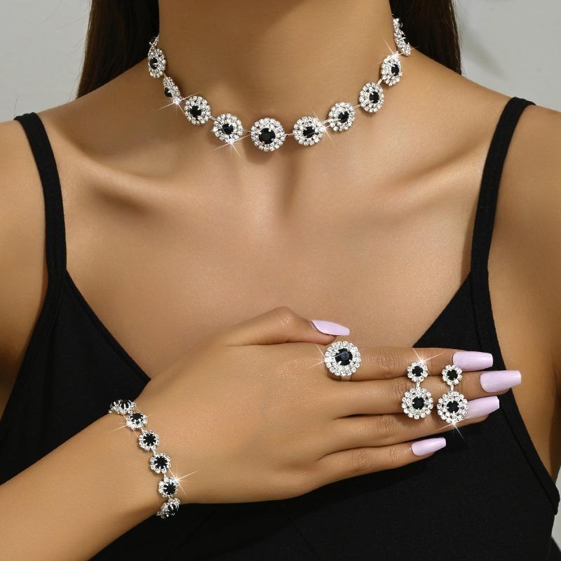 

Meier Set of decorative jewelry: necklace, earrings, bracelet, ring - round minimalist set - dress accessories