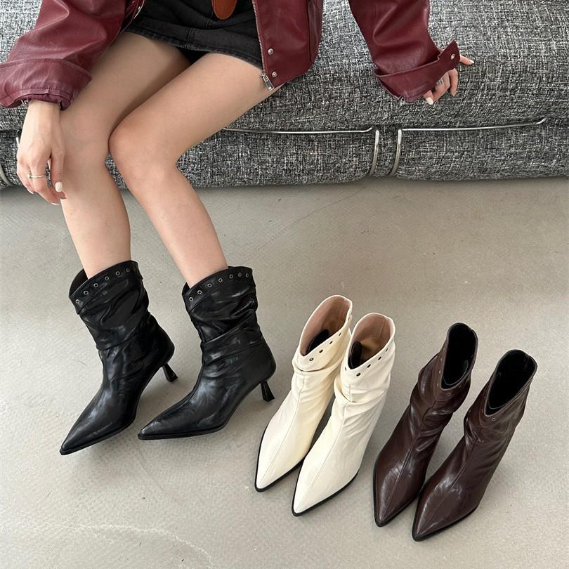 French pointed high-heeled short boots women's shoes 2025 new autumn and winter temperament pleated piled boots stiletto rivets small bare boots