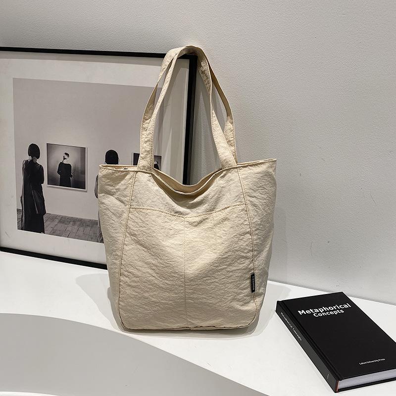 Japanese aesthetic, foreign style, personalized leisure shoulder bag, female student class handbag, niche commuter tote big bag