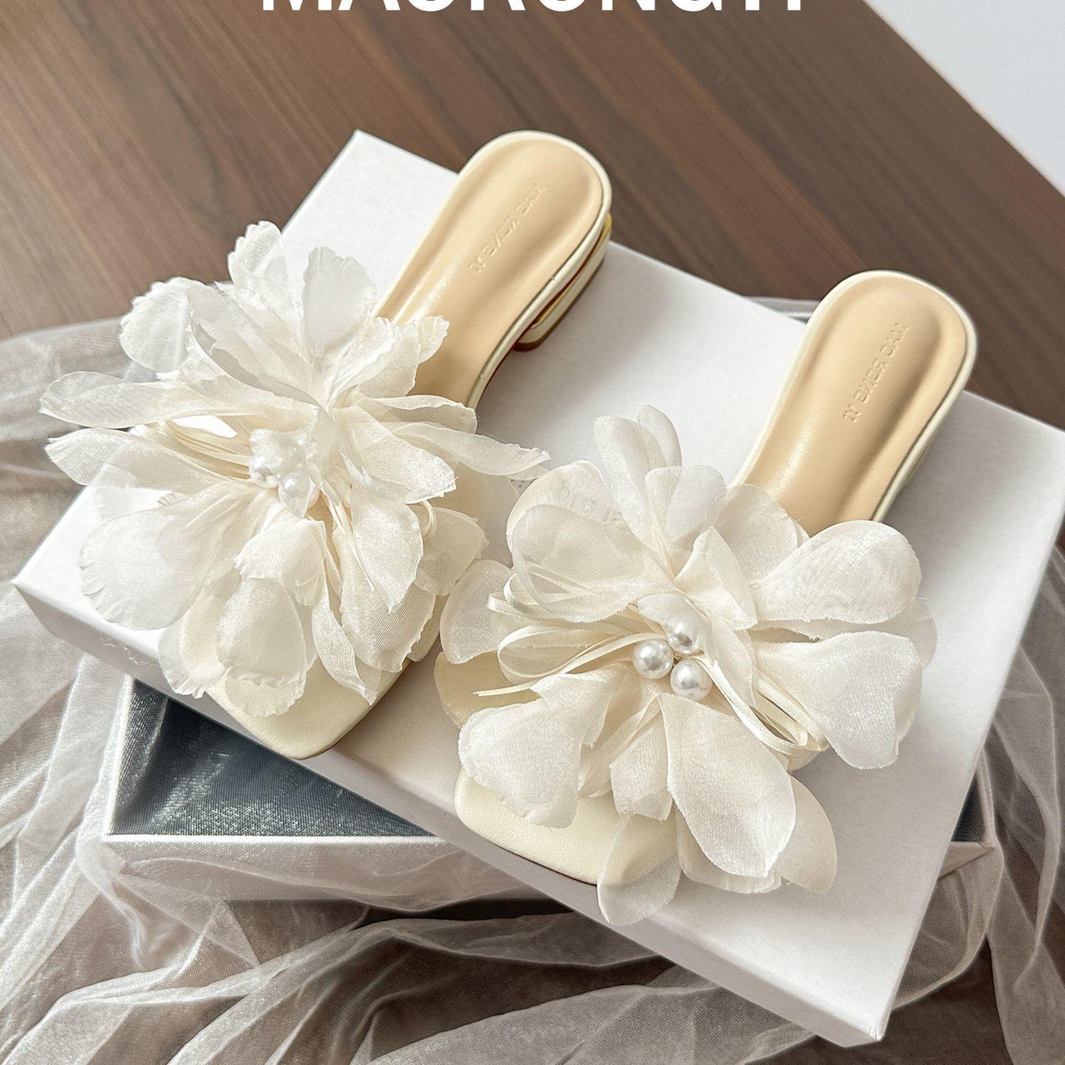 

Fairy wind pearl thick heel cool slippers female summer wear 2025 fashion high sense flat bottom one-word low heel 40