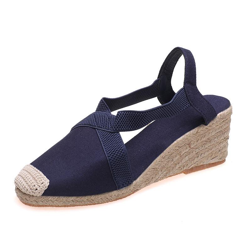 Spring and summer retro baotou straw woven wedge heel sandals cross strap platform high heel large size fisherman shoes