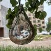 Colorful Silver Stainless Steel Raindrop Wind Spinner - 3D Foldable Ornament for Home and Balcony.
