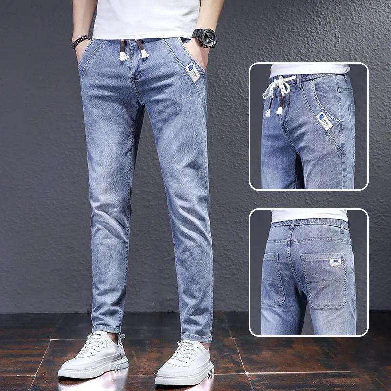 

Elastic Waist Light-washed Denim Jeans Loose-fit Trendy Harem Pants Casual Spring Summer Thin Version for Men XS темно-синього кольору