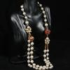 of Vintage Long and Unique Sweater Chain Design with a Court-style Glazed Pearl Necklace