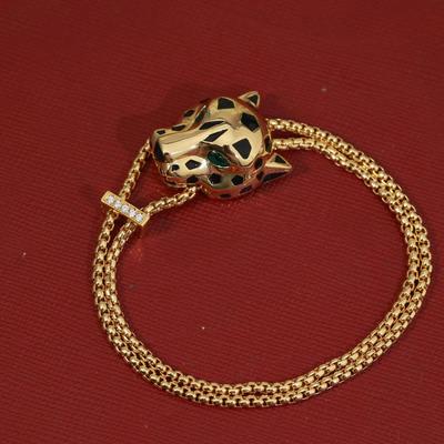 Leopardenarmband mit Sub-Gold-Material galvanisiert mit 18 Karat Gold und gepaart mit Smaragd-Leopardenaugen-Schmuck