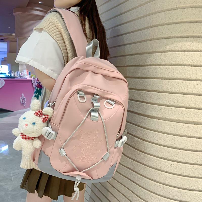 Spring letter printing student schoolbag Korean version of junior high school student drawstring large-capacity backpack with pendant розовый